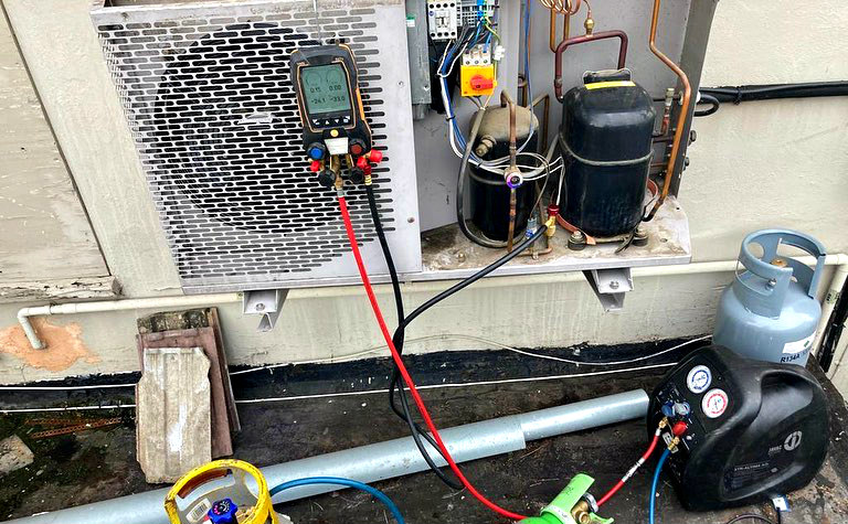 repairing an air conditioning unit compressor