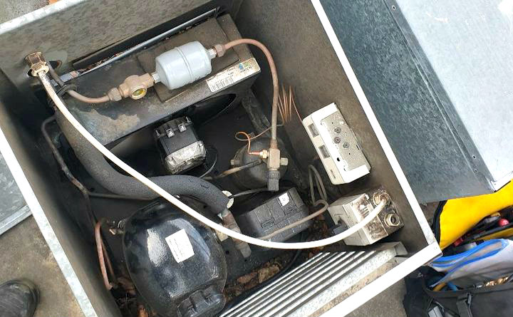 repairing a faulty air conditioning unit